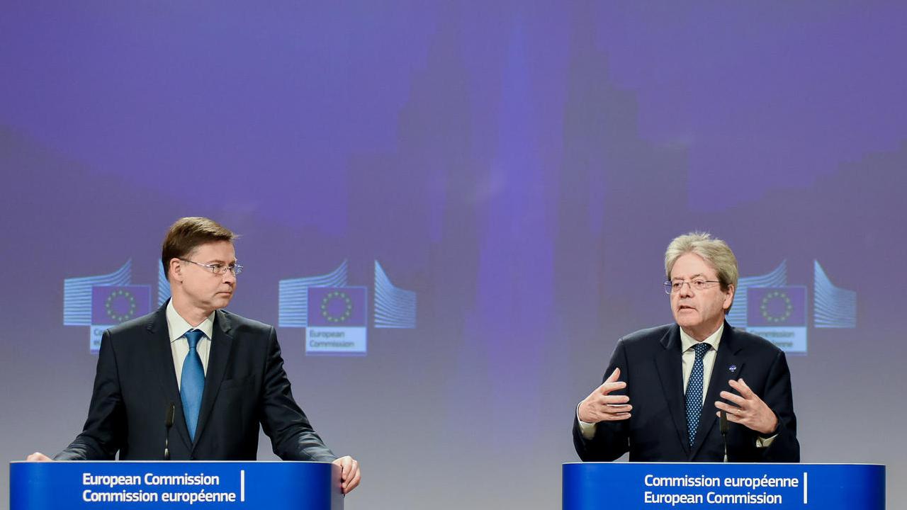 EU-kommissionärerna Valdis Dombrovskis, en konservativ lett, och Paolo Gentiloni, en socialdemokratisk italienare.