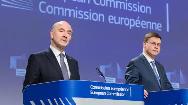 EU-kommissionärerna Pierre Moscovici och Valdis Dombrovskis presenterade överenskommelsen med Italien på en presskonferens.